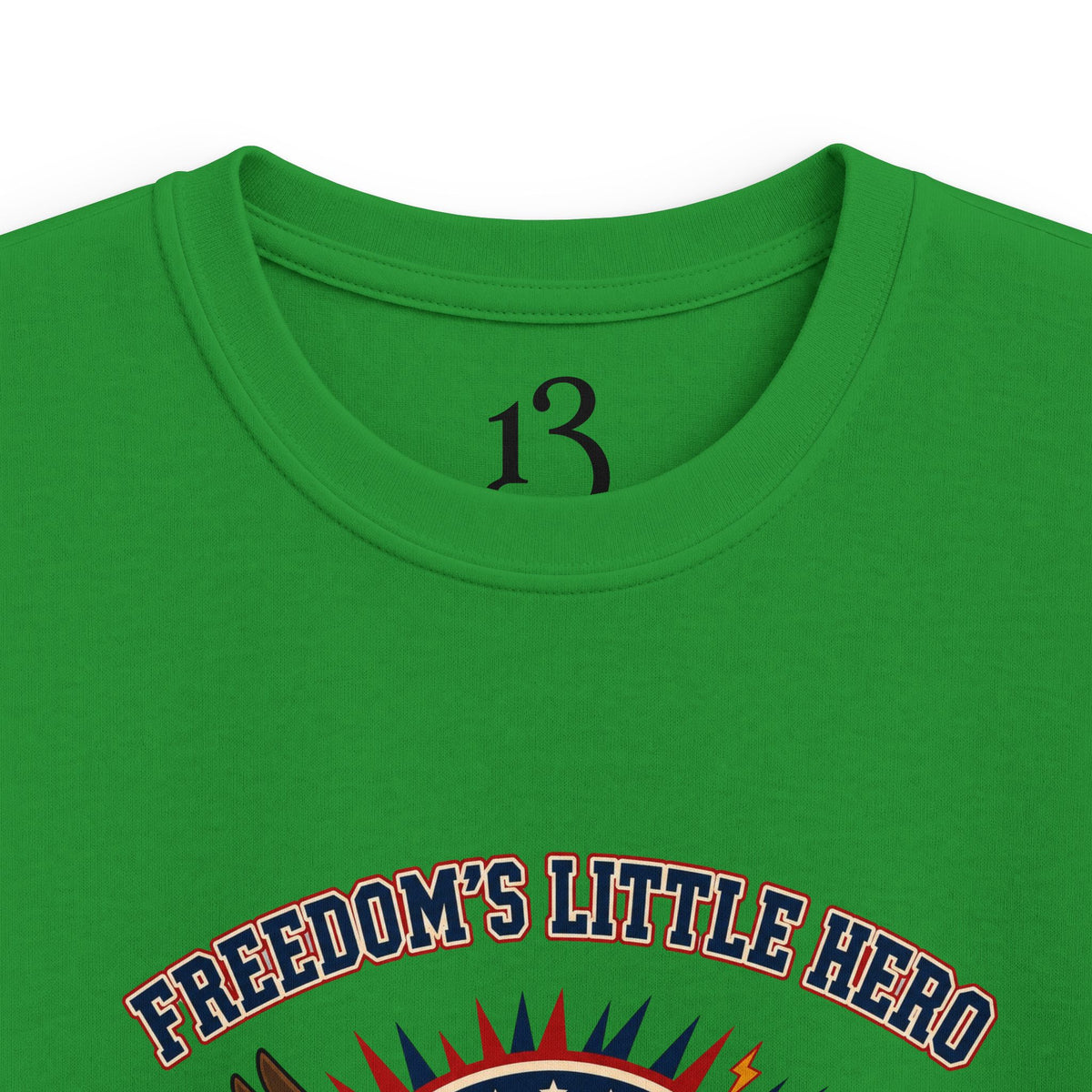 Close-up of Irish green kids T-shirt neckline and “Freedom’s Little Hero” graphic.