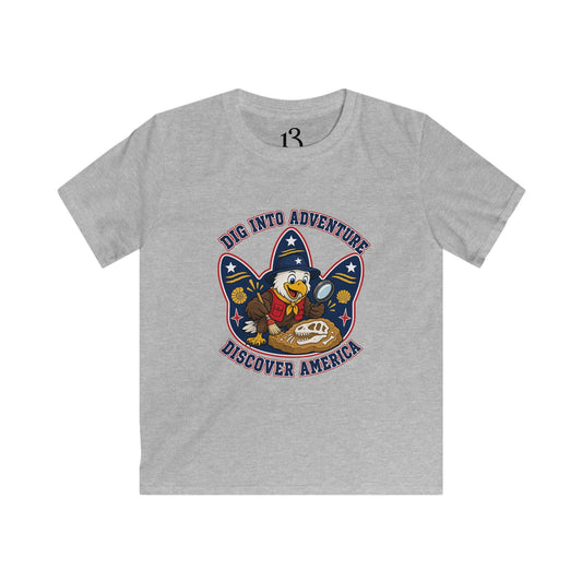 Kids Dig Into Adventure Discover America T-shirt with eagle uncovering a fossil
